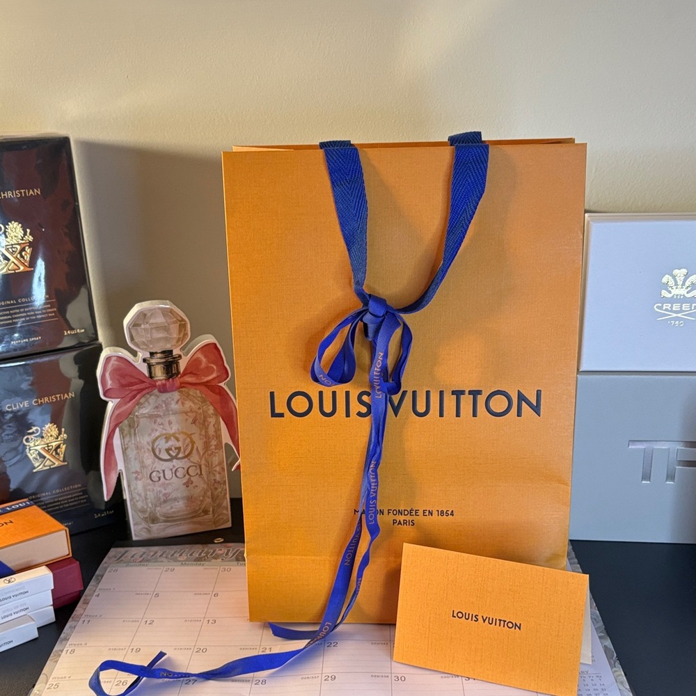 Louis Vuitton Orange Bag with Blue Handles
